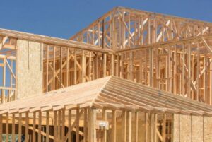depositphotos_153655630-stock-photo-wood-home-framing-abstract-at
