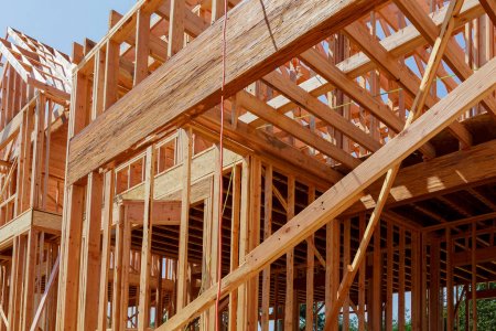depositphotos_191359488-stock-photo-new-residential-construction-home-framing