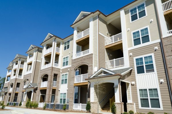 depositphotos_23579053-stock-photo-new-apartment-building-in-suburban